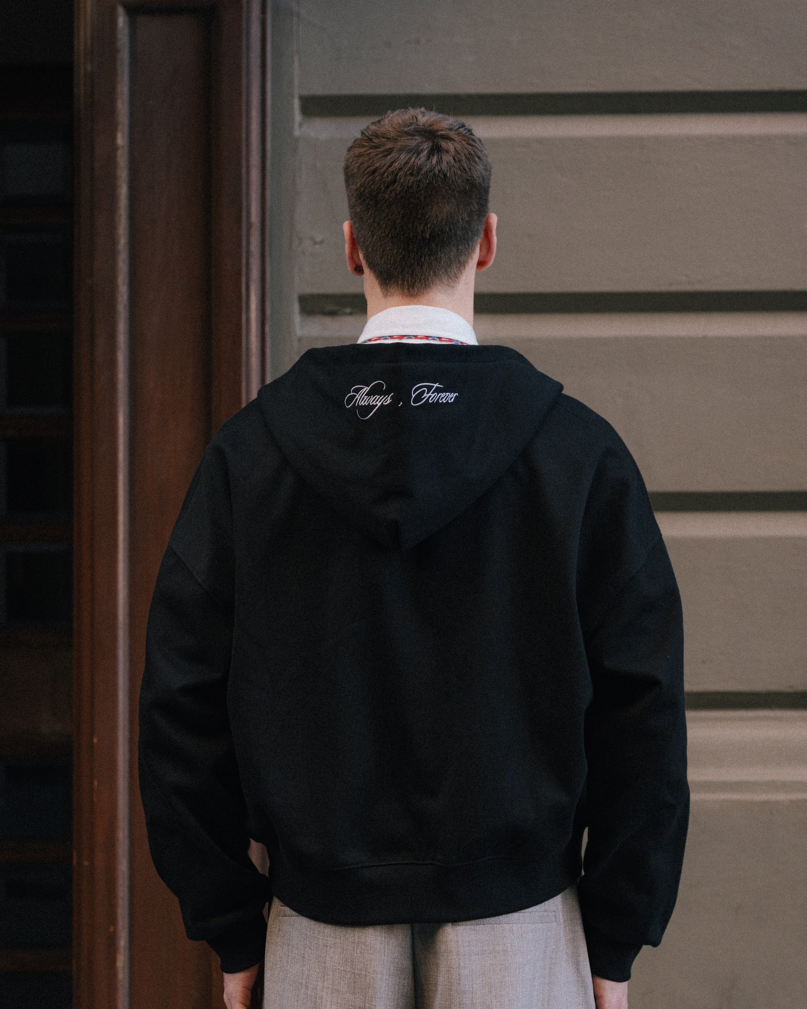 Black hoodie on body, back