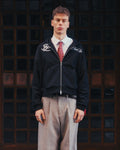 Black hoodie on body, front, styled with shirt and tie