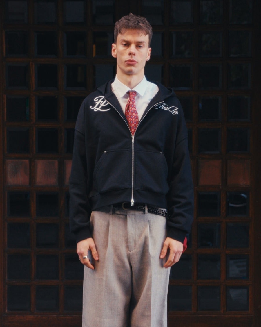 Black hoodie on body, front, styled with shirt and tie