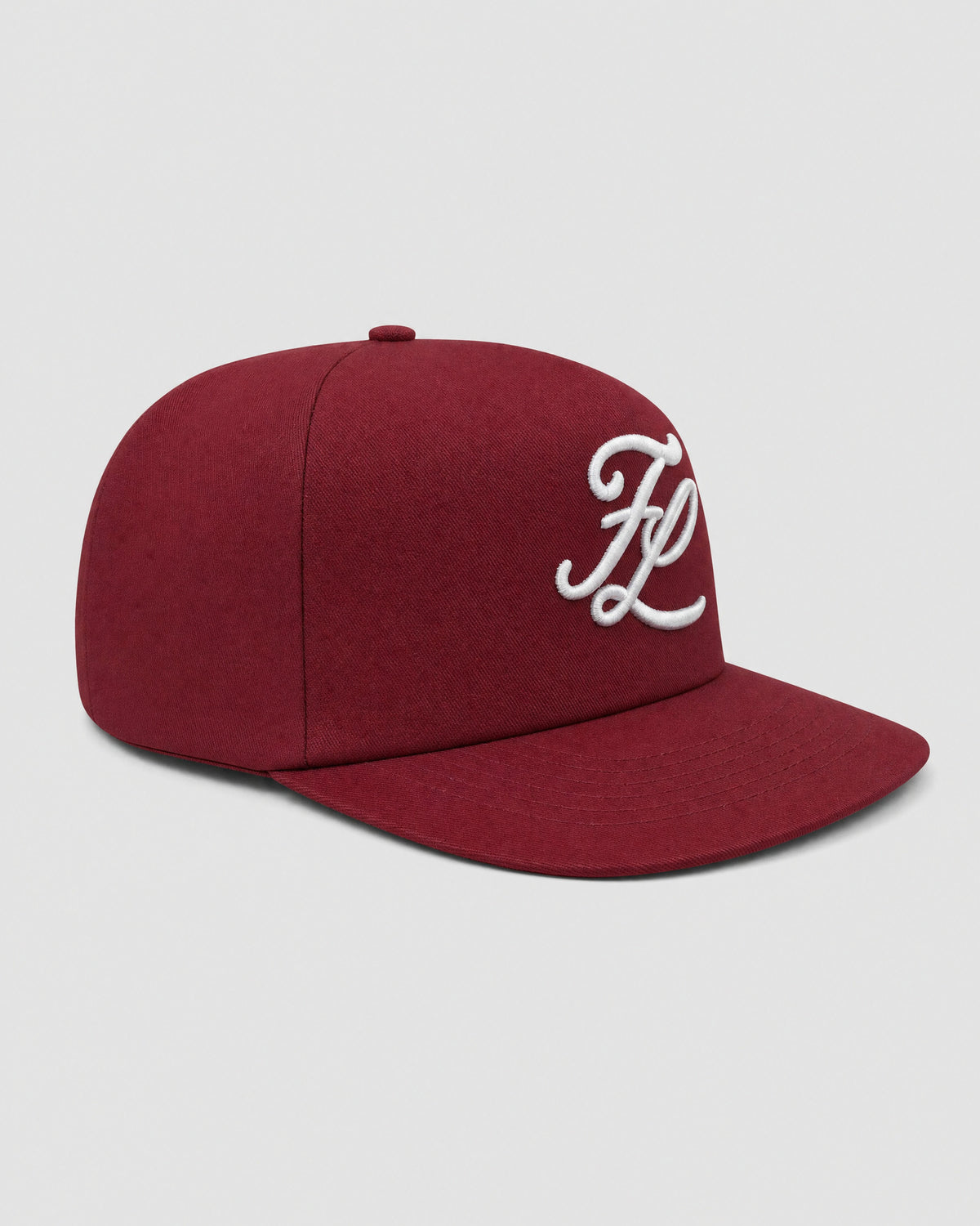 Burgundy cap, three-quarter